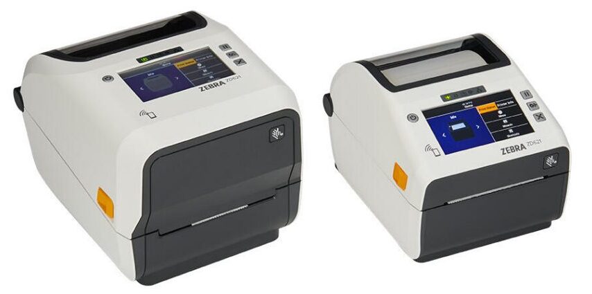 Two Zebra ZD621 HC Premium Healthcare Desktop Label Printers. The unit on the left is the Thermal Transfer model, equipped for high-durability printing using ribbons, while the unit on the right is the Direct Thermal model, ideal for short-term label printing without the need for ribbons. Both printers are designed for healthcare environments, offering features like disinfectant-ready housing and advanced printing capabilities for patient identification, laboratory samples, and medical asset labeling.