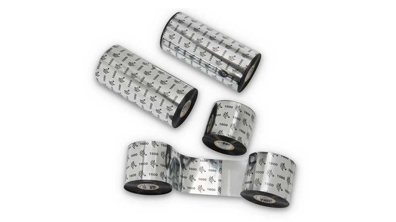 Multiple rolls of Zebra Genuine Wax Ribbons, featuring the branded metallic packaging marked with the Zebra logo and '1600' series, ideal for reliable and high-quality thermal printing solutions.