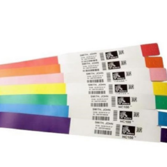 Zebra Z-Band Fusion adult wristbands in a variety of vibrant colours, featuring printable patient information, barcodes, and secure closures, designed for durable and reliable identification in healthcare environments.