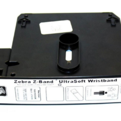 Close-up of a Zebra Z-Band UltraSoft wristband cartridge, designed for use with Zebra HC100 printers, featuring antimicrobial-coated wristbands for patient identification in healthcare environments.