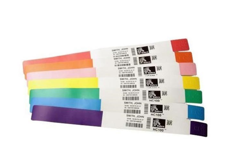 Zebra Z-Band Fusion pediatric wristbands in assorted colours, featuring patient identification details, barcodes, and QR codes, designed for secure and durable use in healthcare settings.