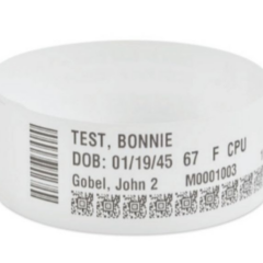 Zebra Z-Band Direct Lite wristband featuring printed patient information, barcode, and QR codes, designed for reliable identification in healthcare environments.